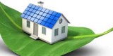 Solar cell house icon on green leaf - Alternative energy
